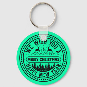 Wij wensen u een prettig kerstfeest en een gelukki sleutelhanger