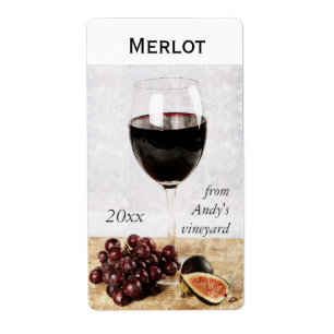 Wijnglas met de sticker van de fruitwijnfles