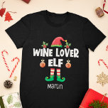 Wijnliefhebber elf Kerstmis familie outfit naam T-shirt<br><div class="desc">Stap in de vakantiedrang met dit leuke Wine Lover elf t-shirt dat deel uitmaakt van een bijpassend familie elf outfit collectie met geschenken voor elk lid van de familie. Dit T-shirt is ideaal voor elke kerst familie reünie en heeft een schattig elf pet en leuke poten, met het onderschrift "Wine...</div>