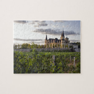 Wijnmakerij gebouwen gezien vanuit de wijngaard bi legpuzzel
