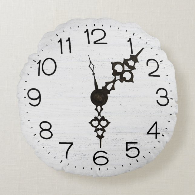  wijzerplaat op witgekalkt hout rond kussen (Voorkant)