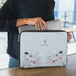 Wild Floral Laptop Sleeve<br><div class="desc">De Wild Floral Laptop Sleeve op een stoffige blauwe achtergrond biedt een prachtige mix van natuurlijke en rustieke charme. Ontworpen met wilde bloemen in subtiele, aardse kleuren op een rustgevende stoffige blauwe achtergrond, voegt deze laptophoes een unieke en stijlvolle esthetiek toe aan uw dagelijkse zakelijke of persoonlijke routine. Het bloemige...</div>