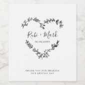 Wildbloemen en bladeren hart in zwart wijn etiket (Enkel label)