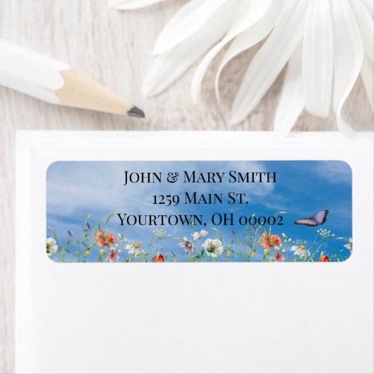 Wildbloemgrens en vlinder etiket (Insitu)