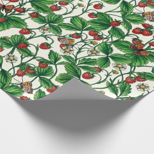 Wilde aardbeien op gebroken wit cadeaupapier (Hoek)