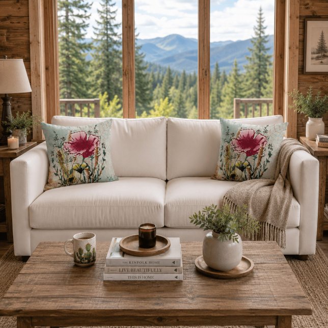 Wilde Bloem Botanische Worp Kussen (White sofa with matching wildflower botanical throw pillows in a bright contemporary cabin.)