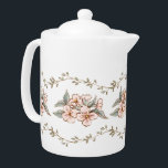 Wilde bloem Tuinpartij Theepot<br><div class="desc">Deze mooie theepot heeft een delicate, bladachtige wijngrens boven en onder met roze wilde bloemen die door het centrum lopen. De kleuren zijn onder meer grijsgroen, wazig roze en bruin.</div>