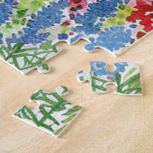 Wilde bloemen bij een meer legpuzzel (Zijkant)