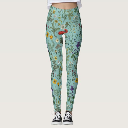 Wilde bloemen collage op blauw leggings (Voorkant)