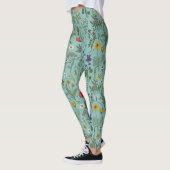 Wilde bloemen collage op blauw leggings (Links)