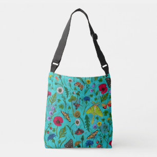 Wilde bloemen en motten op blauwgroen crossbody tas