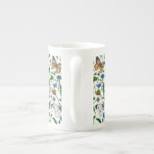 Wilde bloemen en vlinders op wit porselein kop (Achterkant)
