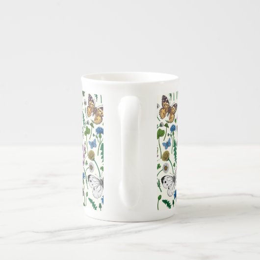 Wilde bloemen en vlinders op wit porselein kop (Achterkant)