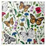 Wilde bloemen en vlinders op wit tegeltje<br><div class="desc">Met de hand geschilderd collectie van diverse vlinders en wilde bloemen.</div>