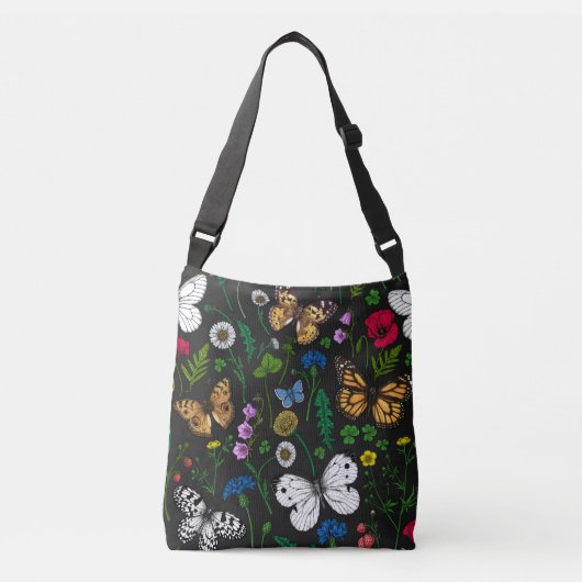 Wilde bloemen en vlinders op zwart crossbody tas (Voorkant)