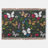 Wilde bloemen en vlinders op zwart deken (Voorkant)