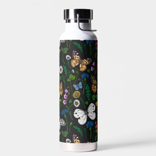 Wilde bloemen en vlinders op zwart waterfles (Links)