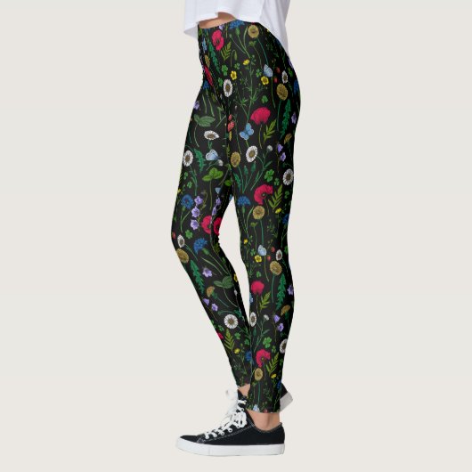 Wilde bloemen op zwart leggings (Links)