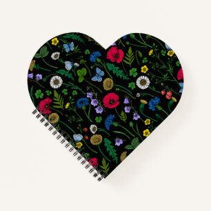 Wilde bloemen op zwart notitieboek