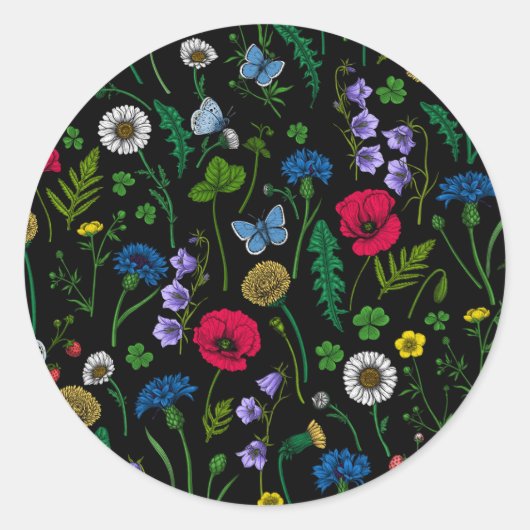 Wilde bloemen op zwart ronde sticker (Voorkant)