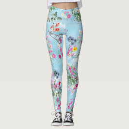 Wilde bloemen tegen een blauwe hemel leggings
