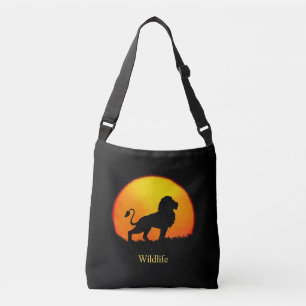Wilde leeuw en zonsopgang op het oerwoud crossbody tas