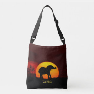 Wilde olifant & zonsopgang in de jungle crossbody tas