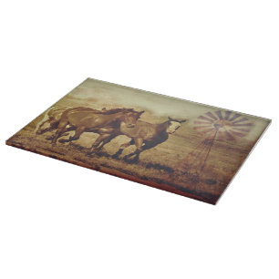 Wilde paarden en windmolens snijplank