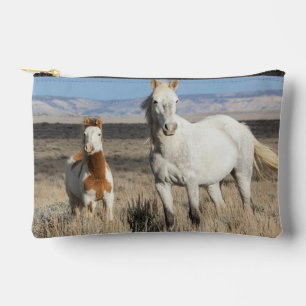 Wilde paarden thuis in het Sandwash-bekken Etui