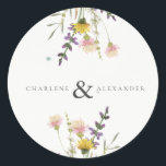 Wildflower Meadow Garden Wedding Ronde Sticker<br><div class="desc">Leg de essentie van je liefdesverhaal vast met onze Wildflower Meadown Garden Wedding stickers,  aangepast met de naam van de bruid en bruidegom. Perfect voor al uw huwelijksgunsten of om te worden gebruikt als envelopzegels.</div>