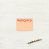 Willekeurig formaat oranje harten post-it® notes (Op bureau)