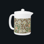 William Morris Clover Botanische Bloem Theepot<br><div class="desc">Antiek Clover William Morris Floral Wallpaper Design — Het Clover-patroon van de Britse textielontwerper uit de 19e eeuw William Morris shows van een prachtig patroon van witte en oranje klavers in een veld van groene en grijze bladeren. Het voortreffelijke bloempatroon werd ontworpen door de beroemde negentiende-eeuwse textiel- en behangselontwerper William...</div>