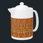 William Morris Pattern Red Turquoise Gold Theepot<br><div class="desc">William Morris Pattern Red Turquoise Gold - Dit product is verfraaid met een elegant 19e-eeuws behangontwerp gemaakt door de bekende Engelse textielontwerper en -producent William Morris die leefde van 1834-1896. Morris leverde een belangrijke bijdrage aan de heropleving van de traditionele Britse textielkunst en productiemethoden.</div>