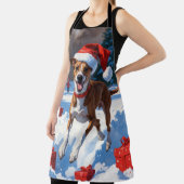 Windhond hardlopen in de sneeuw met kerst Pet Schort (Insitu)