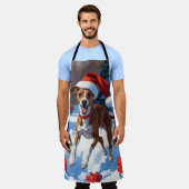 Windhond hardlopen in de sneeuw met kerst Pet Schort (Gedragen)