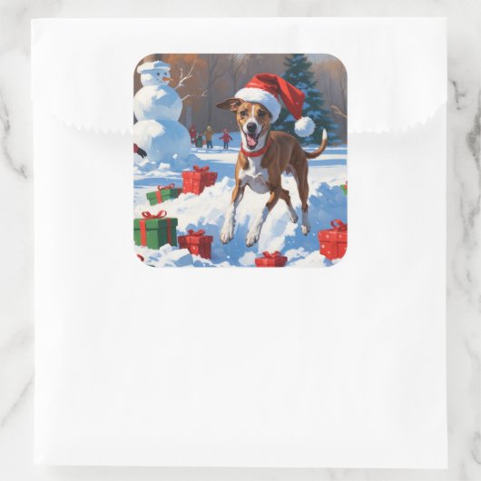 Windhond hardlopen in de sneeuw met kerst Pet Vierkante Sticker (Tas)