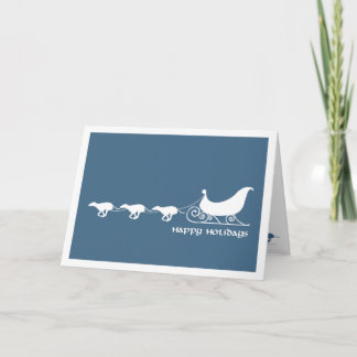 Windhonden trekken aan de slee van de kerstman feestdagen kaart