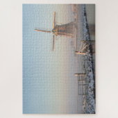 Windmolen en hek tijdens de winterzonsopgang legpuzzel (Verticaal)