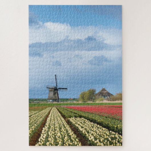 Windmolen en tulpen in een verticaal veerlandschap legpuzzel (Verticaal)