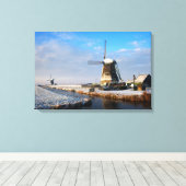 Windmolen in de sneeuw in een nederlands winterlan canvas afdruk (Insitu (Houten vloer))
