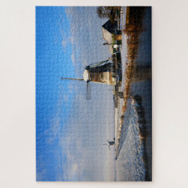 Windmolen in de sneeuw in een nederlands winterlan legpuzzel