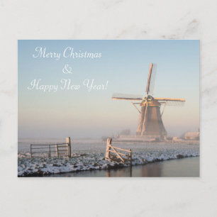 Windmolen in de winter bij zonsopgang kerstkaart feestdagenkaart
