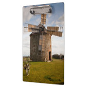 Windmolen in groen veld en witte wolken en blauwe  klembord (Links)