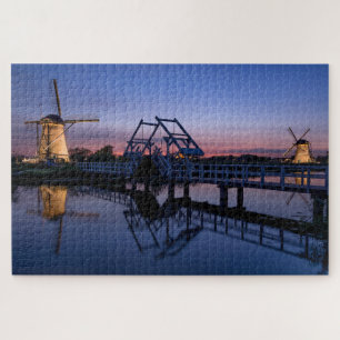 Windmolens en een brug bij zonsondergang legpuzzel