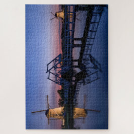 Windmolens en een brug bij zonsondergang legpuzzel