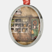 Winkel - De Tweedehandswinkel Metalen Ornament (Links)