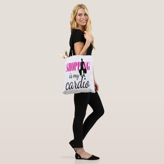 Winkelen is mijn cardio grafische afdruk (v1) tote bag (Op model)