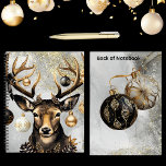 Winter Christmas Deer – Spiral Notitieboek<br><div class="desc">Blijf dit vakantieseizoen georganiseerd en geïnspireerd met het "Winter Christmas Deer" spiraal notitieboek. Met een opvallend ontwerp van een majestueus hert met geweien versierd met elegante gouden en zwarte ornamenten, voegt dit notitieboek een feestelijke maar toch moderne touch toe aan uw collectie voor kantoorbenodigdheden. Met zijn grote formaat van 8,...</div>