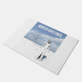 Winter Greetings. Female elf walking in the snow Deurmat (Schuin)