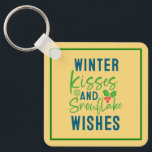 Winter Kisses And Snowflake Wishes-51963 Sleutelhanger<br><div class="desc">Cozy winter quote design featuring “Winter Kisses And Snowflake Wishes.” Perfect for holiday gifts,  Christmas outfits,  and seasonal winter apparel. (Design code-51963).</div>